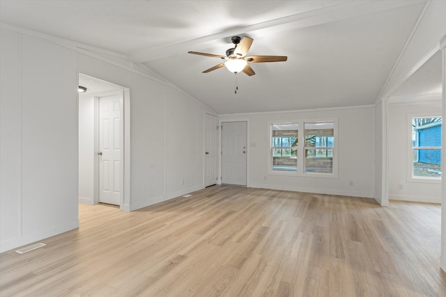 unfurnished living room featuring ceiling fan, lofted ceiling with beams, and light wood-type flooring