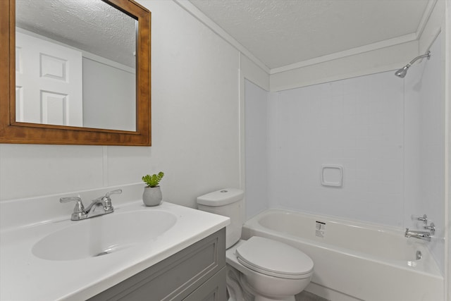 full bathroom featuring vanity, bathtub / shower combination, toilet, and a textured ceiling