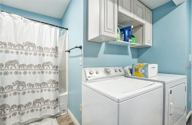 laundry room featuring washer and clothes dryer