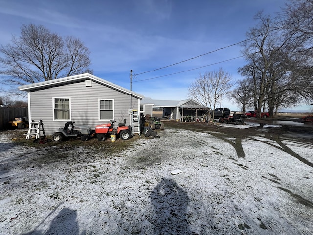 view of snow covered property