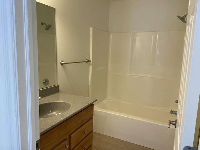 bathroom with vanity, tile patterned floors, and shower / bathtub combination