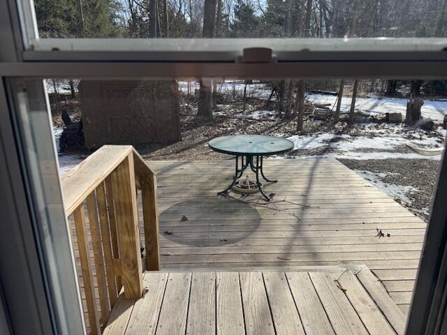 view of snow covered deck