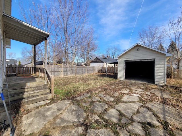 view of yard with a garage and an outdoor structure