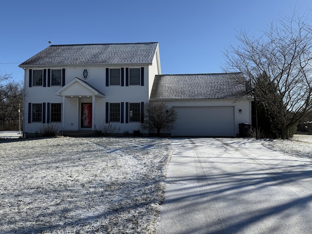 colonial home featuring a garage