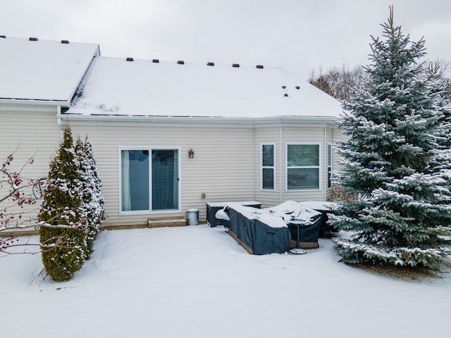 view of snow covered property