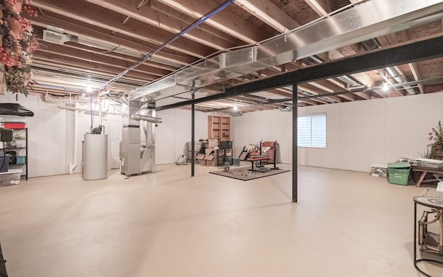 basement with heating unit and gas water heater