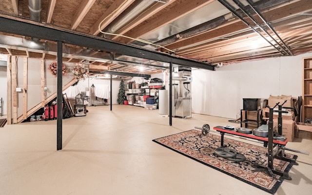 basement featuring gas water heater