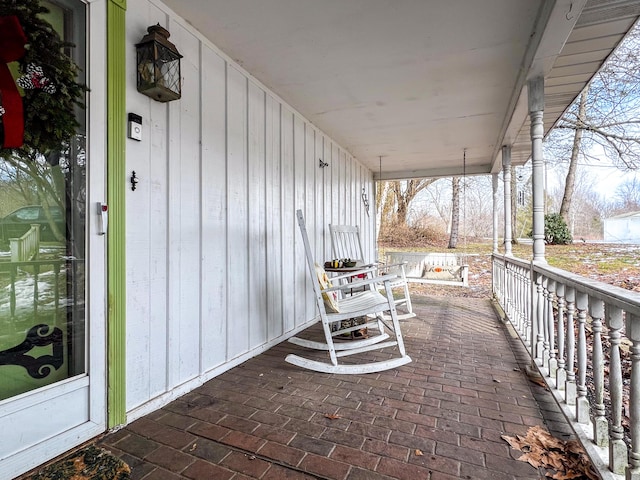 view of patio featuring a porch