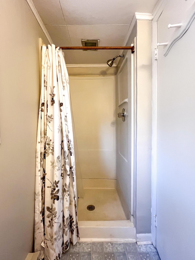 bathroom featuring curtained shower