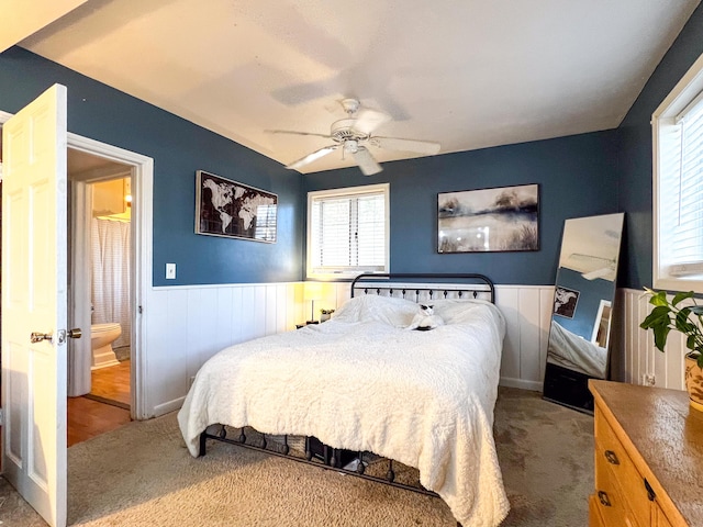 bedroom with ceiling fan and carpet flooring