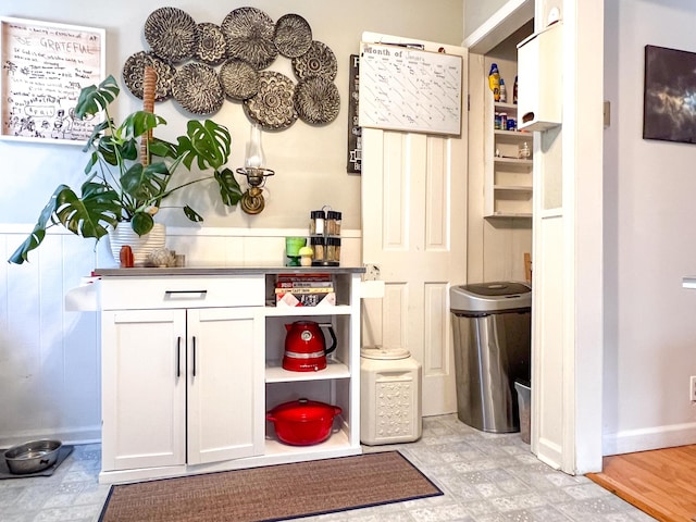 interior space featuring white cabinetry