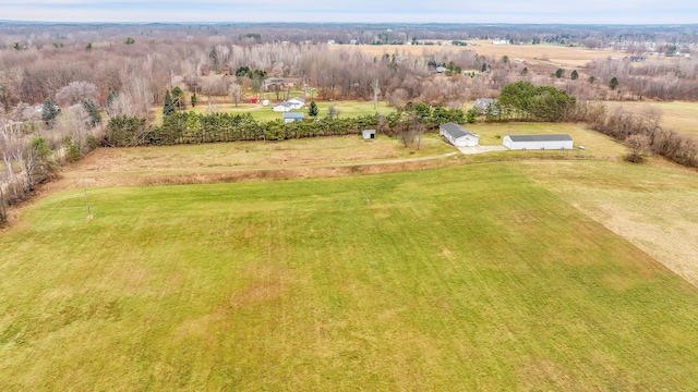 birds eye view of property featuring a rural view