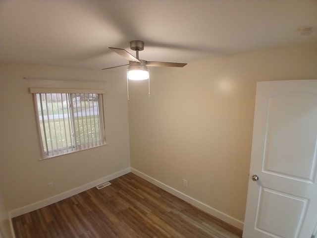 unfurnished room with ceiling fan and wood-type flooring