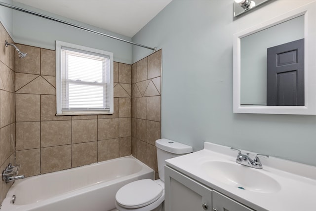 full bathroom with vanity, toilet, and tiled shower / bath