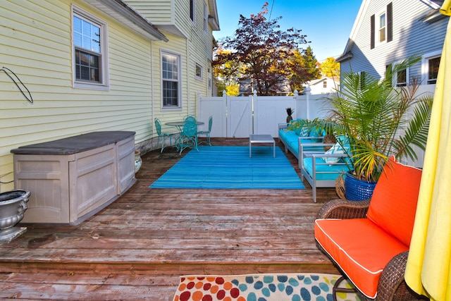 wooden deck featuring an outdoor hangout area