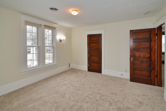 view of carpeted spare room