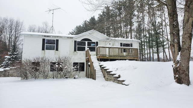 view of front of property with a deck