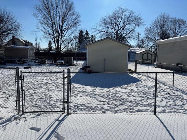 view of yard covered in snow