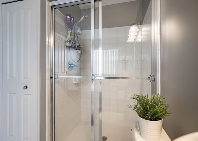 bathroom with an enclosed shower