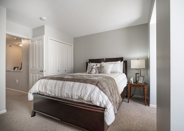 bedroom with a closet and carpet flooring