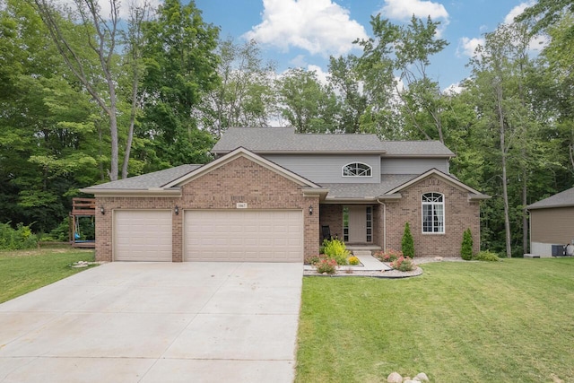 front of property featuring a garage and a front lawn