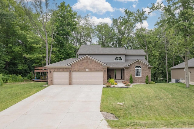 view of front facade featuring a garage and a front lawn