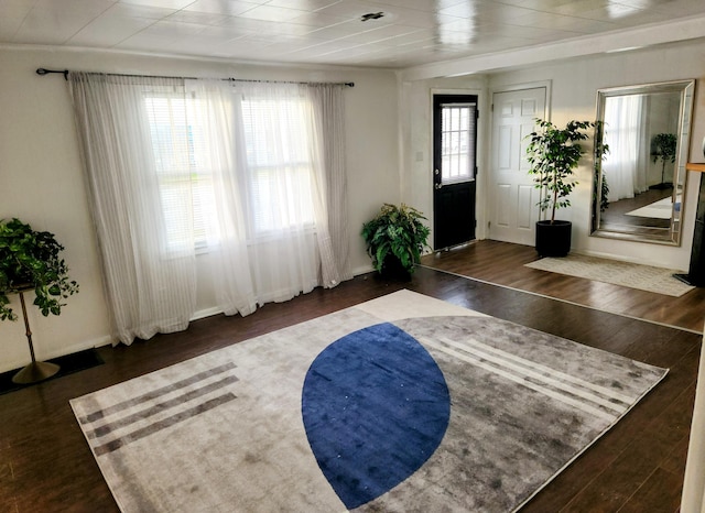 entryway with dark hardwood / wood-style floors