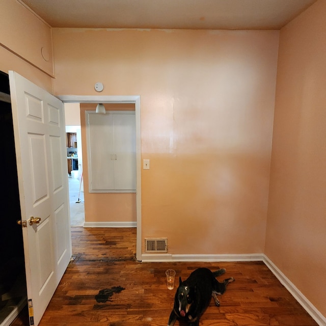 interior space with dark hardwood / wood-style floors