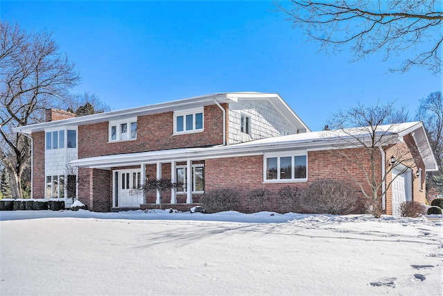 front of property with a garage