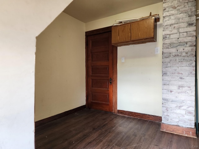 kitchen with dark wood-type flooring