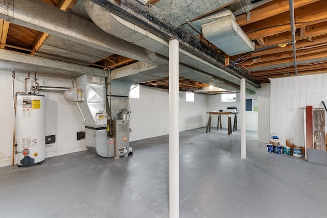 basement with heating unit and water heater