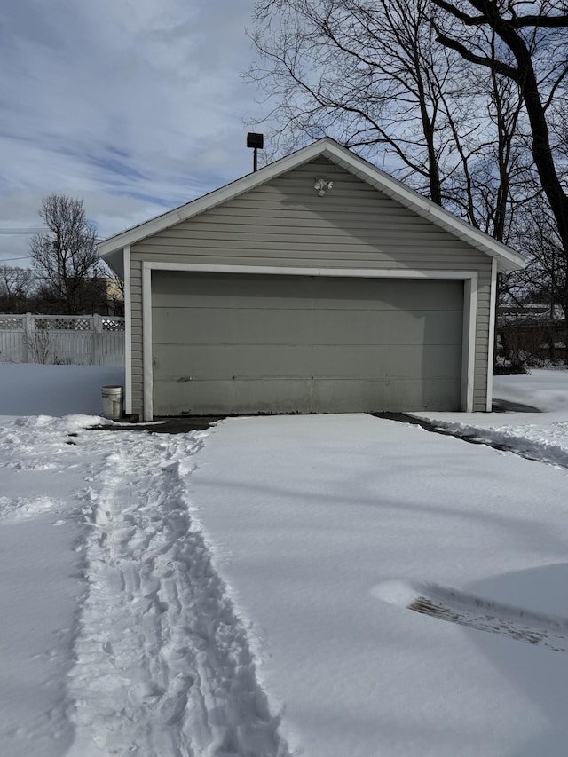 view of snow covered garage