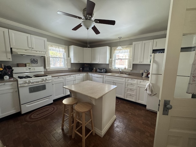 kitchen featuring white cabinetry, white appliances, and crown molding