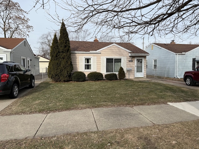 view of front of home with a front lawn