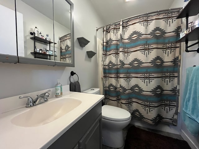 full bathroom featuring vanity, toilet, and shower / bath combo with shower curtain