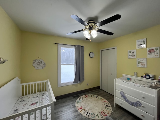 bedroom featuring ceiling fan and dark hardwood / wood-style flooring