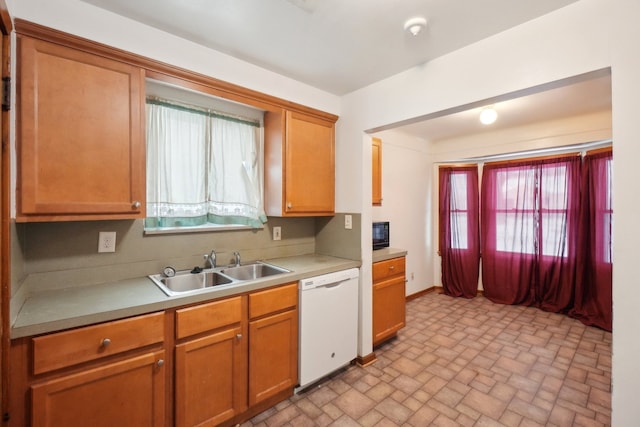 kitchen featuring dishwasher and sink