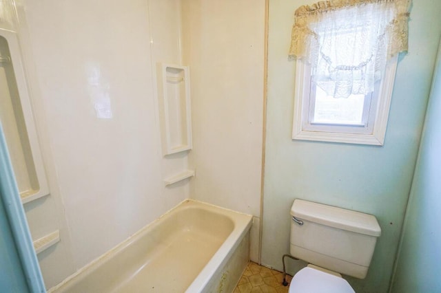 bathroom featuring toilet