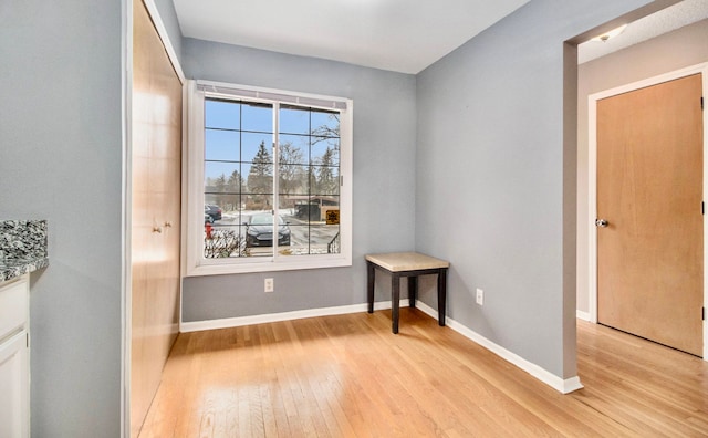 unfurnished room featuring light hardwood / wood-style flooring