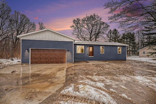 view of front of property with a garage