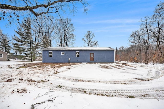 view of snow covered house