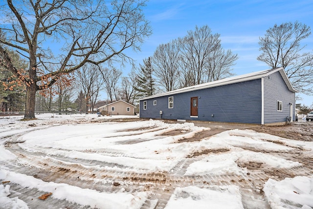 view of snow covered house