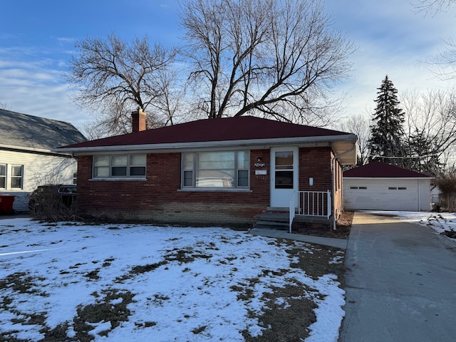 view of front of home featuring an outbuilding and a garage