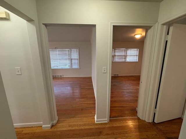 hallway featuring hardwood / wood-style flooring