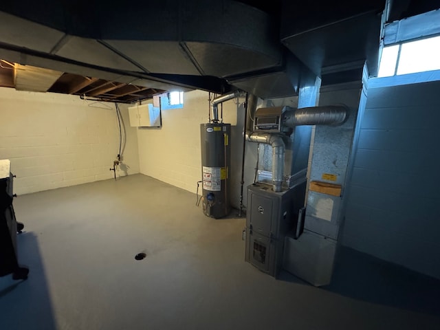 basement with heating unit and gas water heater