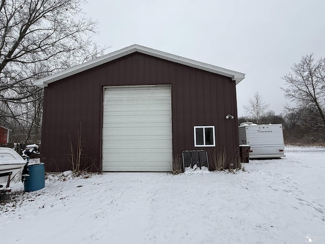 view of snow covered garage