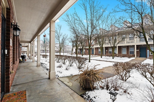 view of snow covered patio