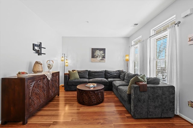 living room with hardwood / wood-style flooring