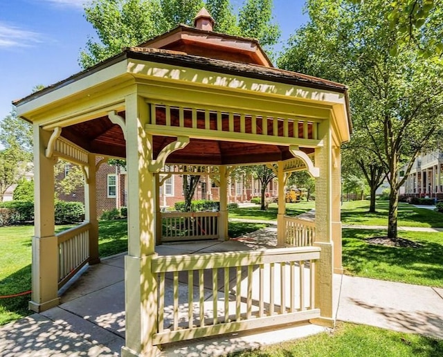 surrounding community featuring a gazebo and a yard