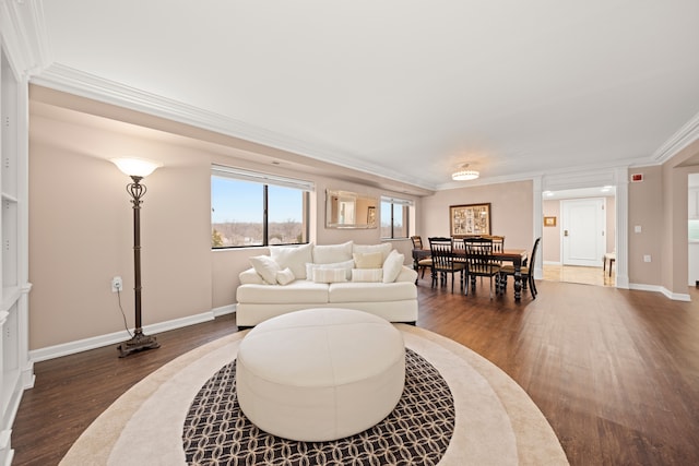 living room with crown molding and dark hardwood / wood-style flooring